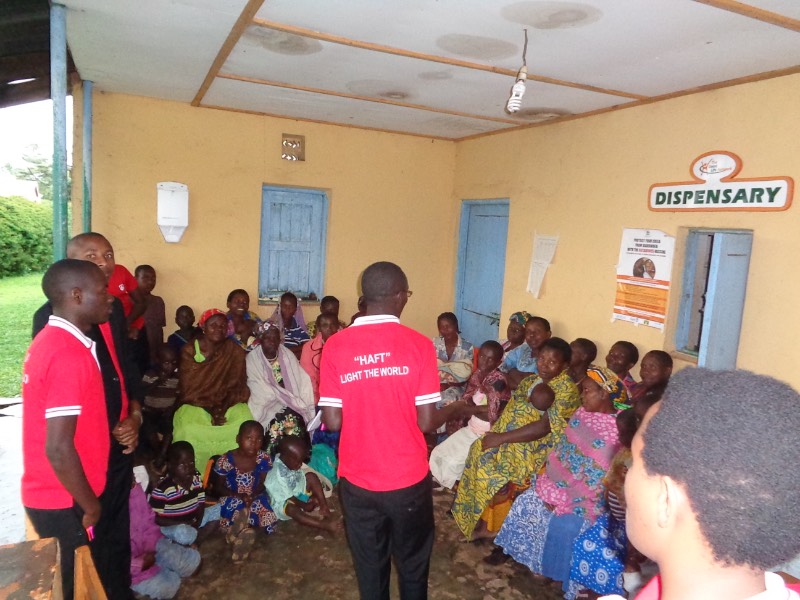 HAFT members educating villagers on nearby Ebola outbreak